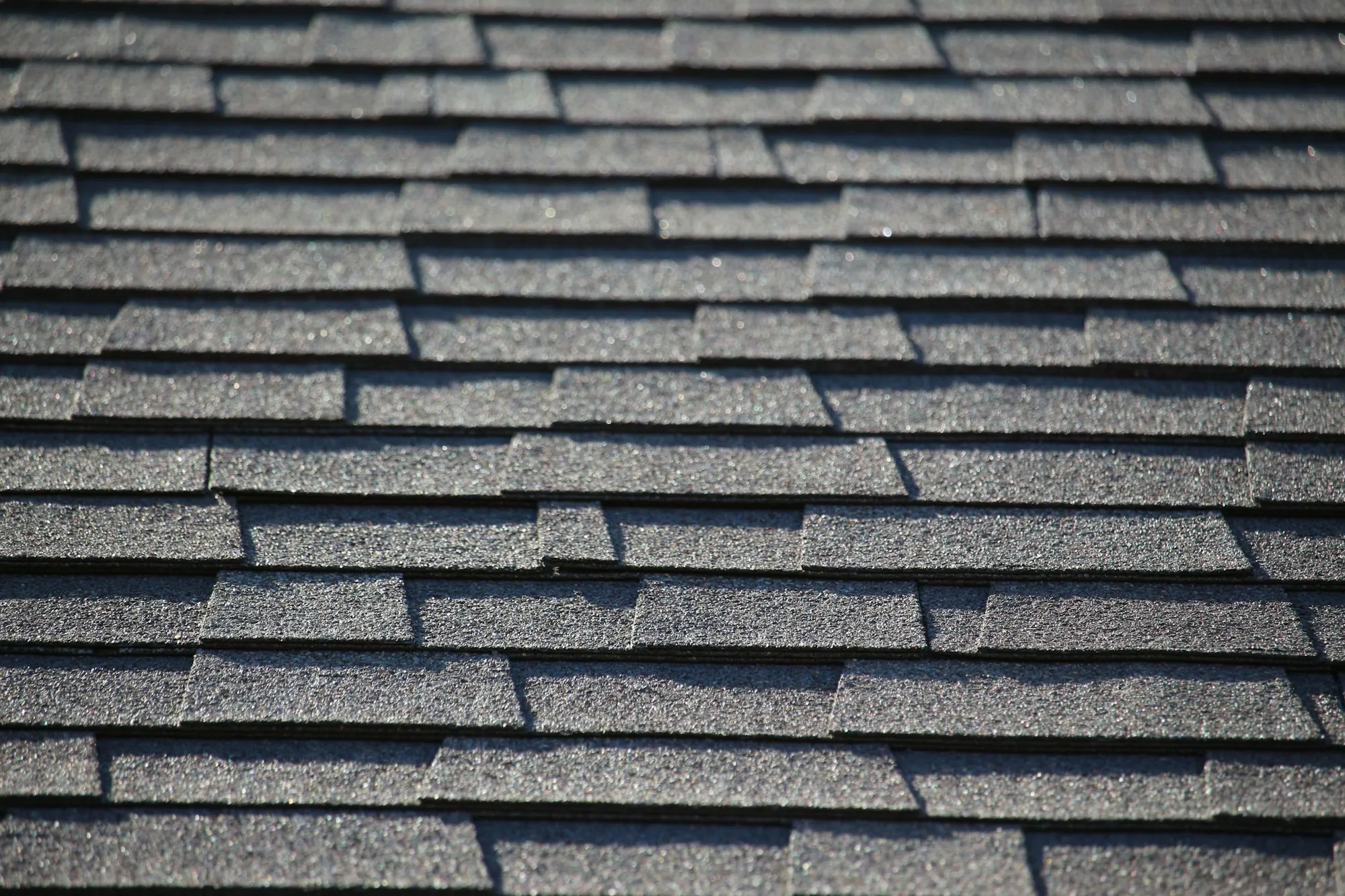 Close-up of gray architectural asphalt shingles